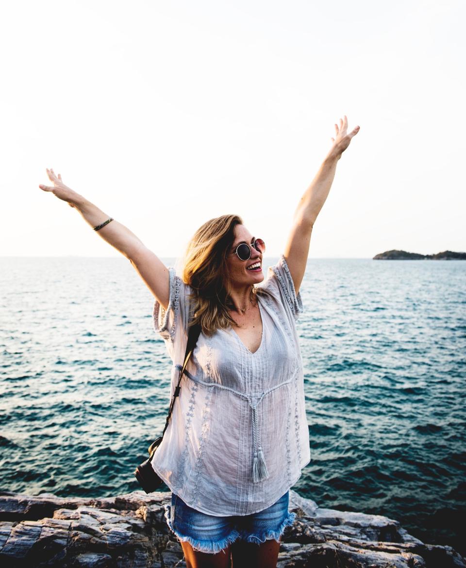 Women in Ocean happy and free from anxiety